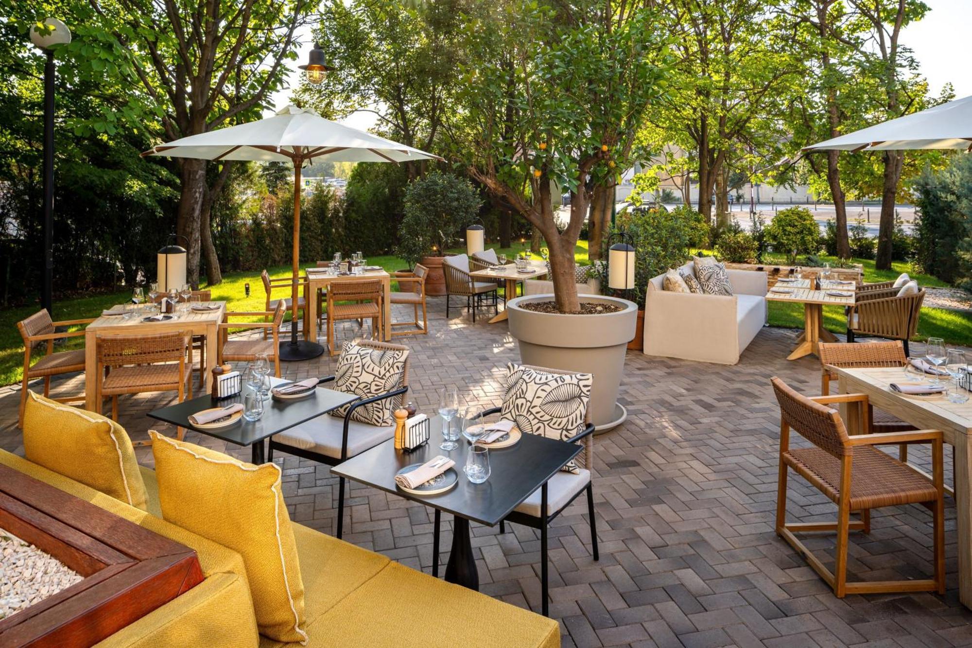 Jw Marriott Bucharest Grand Hotel Exterior photo The Terrace at The Ivy Collection