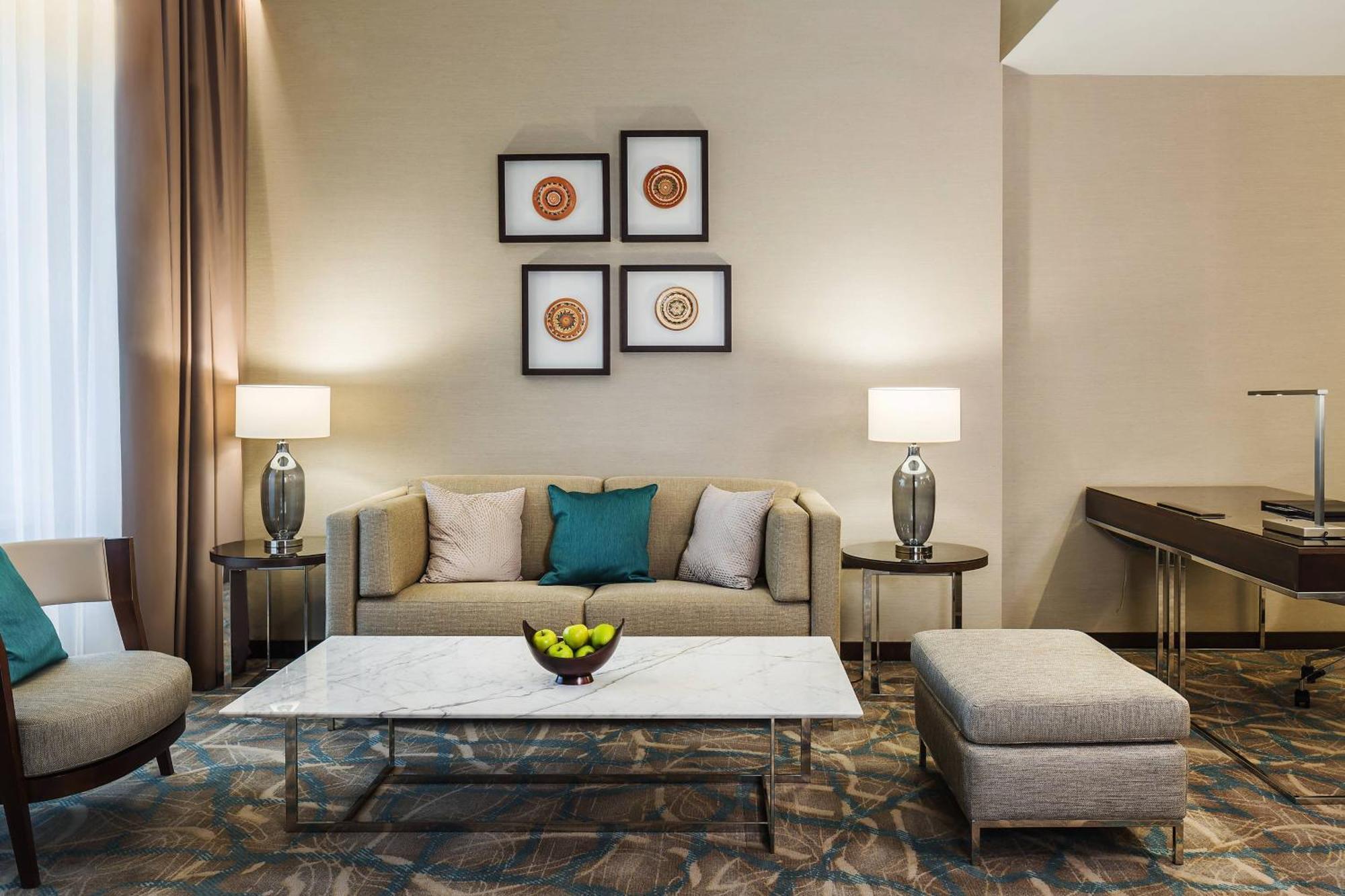 Jw Marriott Bucharest Grand Hotel Exterior photo A living room at the hotel