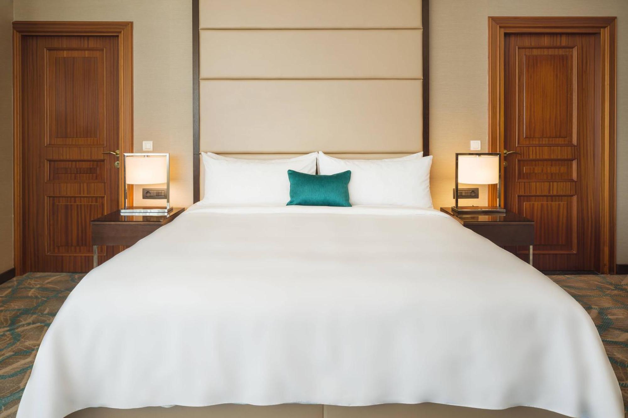 Jw Marriott Bucharest Grand Hotel Exterior photo A bed